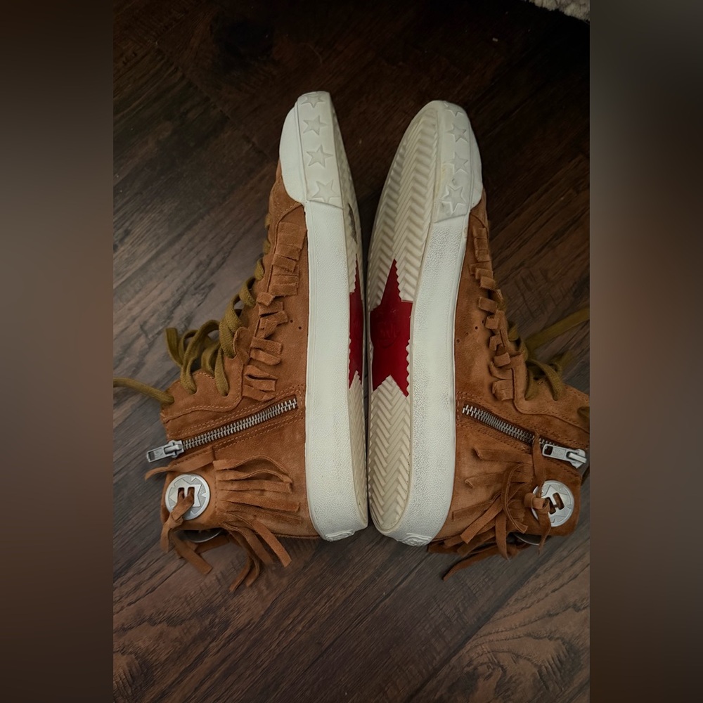 The sneakers are the ASH Marlow Fringe Lace Up High Top Sneakers. Size 38 - Picture 11 of 16